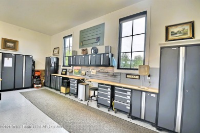 This Modern Masterpiece transcends ordinary luxury with sleek on Teton Springs Resort and Club in Idaho - for sale on GolfHomes.com, golf home, golf lot