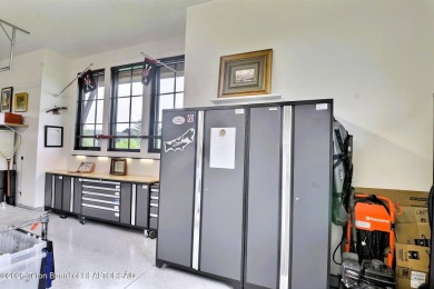 This Modern Masterpiece transcends ordinary luxury with sleek on Teton Springs Resort and Club in Idaho - for sale on GolfHomes.com, golf home, golf lot