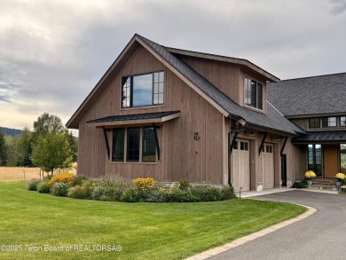 This Modern Masterpiece transcends ordinary luxury with sleek on Teton Springs Resort and Club in Idaho - for sale on GolfHomes.com, golf home, golf lot