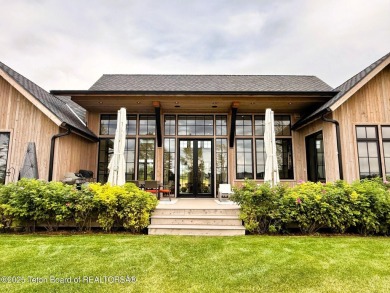 This Modern Masterpiece transcends ordinary luxury with sleek on Teton Springs Resort and Club in Idaho - for sale on GolfHomes.com, golf home, golf lot