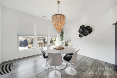 This Dunwoody model brings all the style and smart upgrades. The on Regent Park Golf Club in South Carolina - for sale on GolfHomes.com, golf home, golf lot