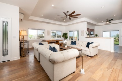 Experience a resort feel with sweeping ocean, coastline, sunset on Waikoloa Village Golf Club in Hawaii - for sale on GolfHomes.com, golf home, golf lot