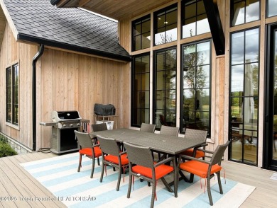 This Modern Masterpiece transcends ordinary luxury with sleek on Teton Springs Resort and Club in Idaho - for sale on GolfHomes.com, golf home, golf lot