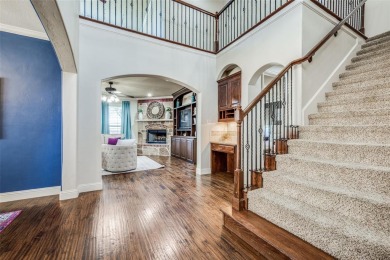 Ideal location + easy highway access. Charming home + great flow on Trophy Club of Dallas - Hogan in Texas - for sale on GolfHomes.com, golf home, golf lot