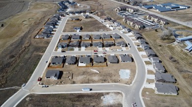 Brand new construction, fully landscaped. Located in Hidden on Hidden Bridge Golf Club in Wyoming - for sale on GolfHomes.com, golf home, golf lot