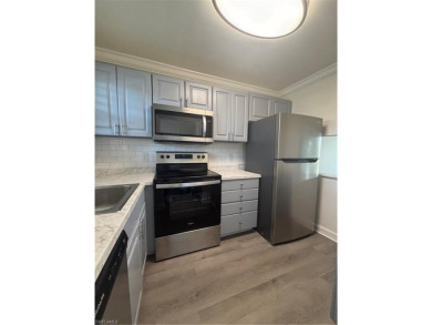 This beautifully renovated 2nd-floor condo in the desirable on Quail Run Golf Club In Naples in Florida - for sale on GolfHomes.com, golf home, golf lot
