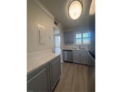 This beautifully renovated 2nd-floor condo in the desirable on Quail Run Golf Club In Naples in Florida - for sale on GolfHomes.com, golf home, golf lot