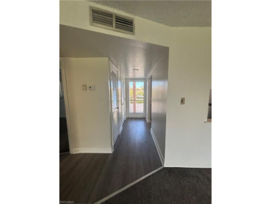 This beautifully renovated 2nd-floor condo in the desirable on Quail Run Golf Club In Naples in Florida - for sale on GolfHomes.com, golf home, golf lot
