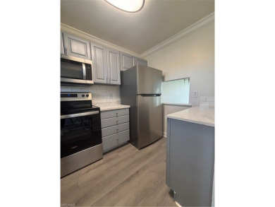 This beautifully renovated 2nd-floor condo in the desirable on Quail Run Golf Club In Naples in Florida - for sale on GolfHomes.com, golf home, golf lot