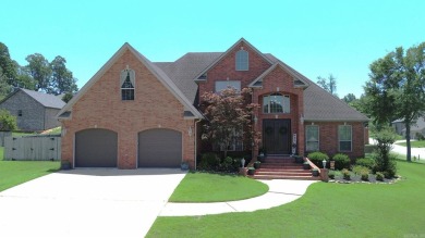 Spacious and elegant 5-bedroom, 3-bath home situated on a on Paragould Country Club in Arkansas - for sale on GolfHomes.com, golf home, golf lot