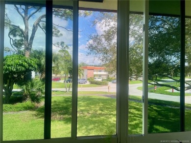 1225 NW 21st Street unit: 2112 on Pine Lakes Golf Club in Florida - for sale on GolfHomes.com, golf home, golf lot
