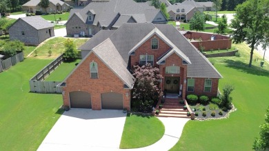 Spacious and elegant 5-bedroom, 3-bath home situated on a on Paragould Country Club in Arkansas - for sale on GolfHomes.com, golf home, golf lot