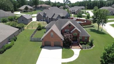 Spacious and elegant 5-bedroom, 3-bath home situated on a on Paragould Country Club in Arkansas - for sale on GolfHomes.com, golf home, golf lot