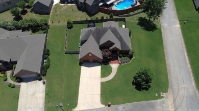 Spacious and elegant 5-bedroom, 3-bath home situated on a on Paragould Country Club in Arkansas - for sale on GolfHomes.com, golf home, golf lot