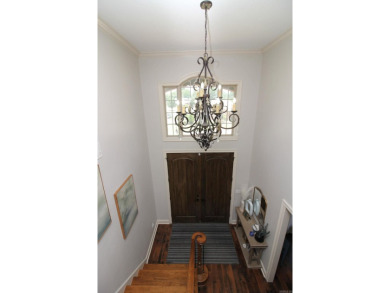 Spacious and elegant 5-bedroom, 3-bath home situated on a on Paragould Country Club in Arkansas - for sale on GolfHomes.com, golf home, golf lot