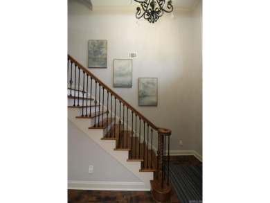 Spacious and elegant 5-bedroom, 3-bath home situated on a on Paragould Country Club in Arkansas - for sale on GolfHomes.com, golf home, golf lot