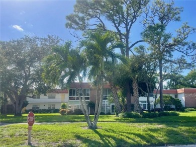 1225 NW 21st Street unit: 2112 on Pine Lakes Golf Club in Florida - for sale on GolfHomes.com, golf home, golf lot