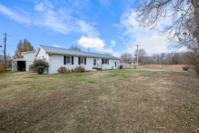Updated brick ranch that is move-in ready and on a spacious on Smithville Golf Club in Tennessee - for sale on GolfHomes.com, golf home, golf lot