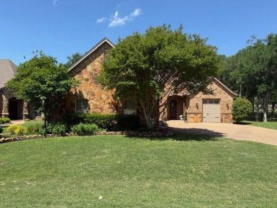 OUTSTANDING FIND IN THE RESORT A EXCLUSIVE GUARDED COMMUNITY ON on The Golf Club at Resort Eagle Mountain Lake in Texas - for sale on GolfHomes.com, golf home, golf lot