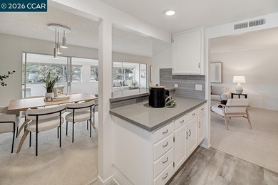 This beautiful Sequoia Wrap model offers lovely vistas, abundant on Rossmoor Golf Course in California - for sale on GolfHomes.com, golf home, golf lot