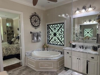 OUTSTANDING FIND IN THE RESORT A EXCLUSIVE GUARDED COMMUNITY ON on The Golf Club at Resort Eagle Mountain Lake in Texas - for sale on GolfHomes.com, golf home, golf lot