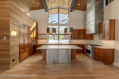 This stunning mountain modern home is situated on one of the on Snake River Sporting Club in Wyoming - for sale on GolfHomes.com, golf home, golf lot