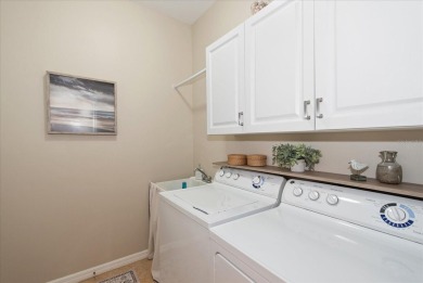 This home has the perfect blend of both comfort and convenience on The Golf Club At Magnolia Landing in Florida - for sale on GolfHomes.com, golf home, golf lot