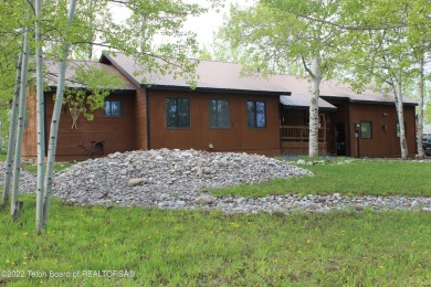 Newly remodeled, one-level home with a fully finished basement on Aspen Hills Golf Course in Wyoming - for sale on GolfHomes.com, golf home, golf lot