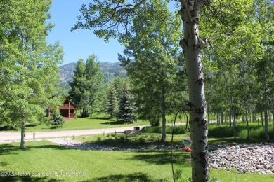 Newly remodeled, one-level home with a fully finished basement on Aspen Hills Golf Course in Wyoming - for sale on GolfHomes.com, golf home, golf lot