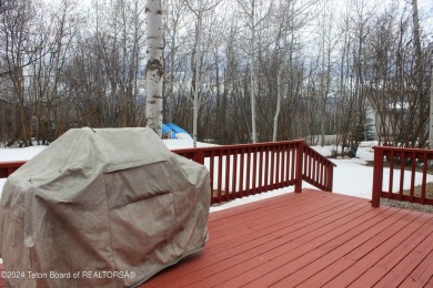 Newly remodeled, one-level home with a fully finished basement on Aspen Hills Golf Course in Wyoming - for sale on GolfHomes.com, golf home, golf lot