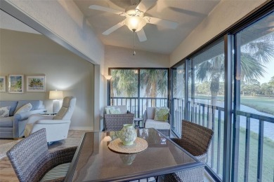 Well maintained END UNIT with WATER VIEW, spacious HIGH CEILINGS on The Meadows Golf and Country Club in Florida - for sale on GolfHomes.com, golf home, golf lot