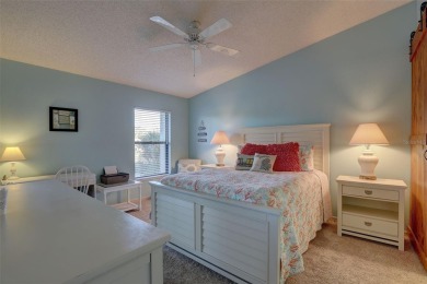 Well maintained END UNIT with WATER VIEW, spacious HIGH CEILINGS on The Meadows Golf and Country Club in Florida - for sale on GolfHomes.com, golf home, golf lot