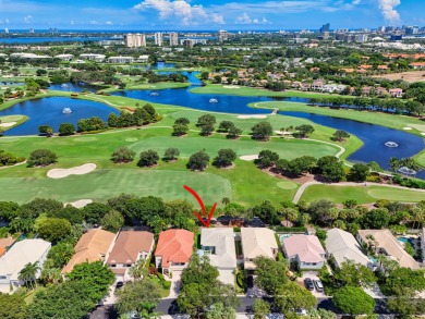 Rarely available single-story courtyard home perfectly situated on  in Florida - for sale on GolfHomes.com, golf home, golf lot