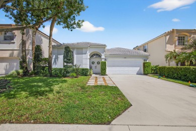Rarely available single-story courtyard home perfectly situated on  in Florida - for sale on GolfHomes.com, golf home, golf lot