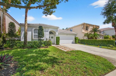 Rarely available single-story courtyard home perfectly situated on  in Florida - for sale on GolfHomes.com, golf home, golf lot