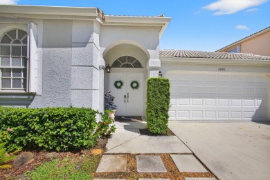 Rarely available single-story courtyard home perfectly situated on  in Florida - for sale on GolfHomes.com, golf home, golf lot
