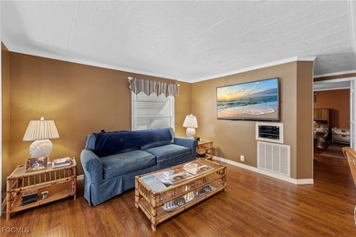 You'll love this unique manufactured home with RARE, attached on Six Lakes Country Club in Florida - for sale on GolfHomes.com, golf home, golf lot