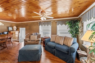You'll love this unique manufactured home with RARE, attached on Six Lakes Country Club in Florida - for sale on GolfHomes.com, golf home, golf lot