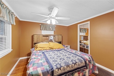 You'll love this unique manufactured home with RARE, attached on Six Lakes Country Club in Florida - for sale on GolfHomes.com, golf home, golf lot