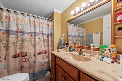 You'll love this unique manufactured home with RARE, attached on Six Lakes Country Club in Florida - for sale on GolfHomes.com, golf home, golf lot