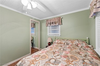 You'll love this unique manufactured home with RARE, attached on Six Lakes Country Club in Florida - for sale on GolfHomes.com, golf home, golf lot