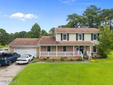 Charming 4-bedroom, 3-bath home located in the heart of on Jacksonville Country Club in North Carolina - for sale on GolfHomes.com, golf home, golf lot