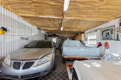 You'll love this unique manufactured home with RARE, attached on Six Lakes Country Club in Florida - for sale on GolfHomes.com, golf home, golf lot