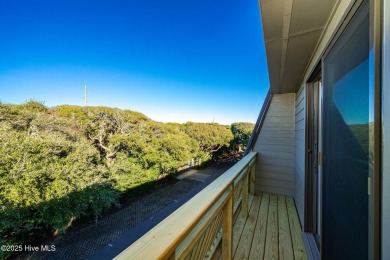 Oceanview condo with peaks of the ocean surrounded by the on The Country Club of the Crystal Coast in North Carolina - for sale on GolfHomes.com, golf home, golf lot