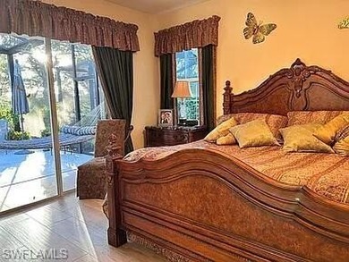 Welcome to a stunning home in Bonita Springs featuring 4 on Palmira Golf and Country Club in Florida - for sale on GolfHomes.com, golf home, golf lot