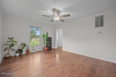 Charming 4-bedroom, 3-bath home located in the heart of on Jacksonville Country Club in North Carolina - for sale on GolfHomes.com, golf home, golf lot