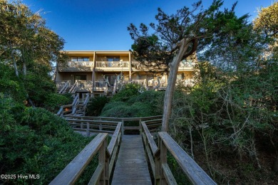 Oceanview condo with peaks of the ocean surrounded by the on The Country Club of the Crystal Coast in North Carolina - for sale on GolfHomes.com, golf home, golf lot