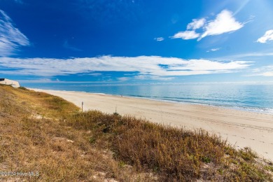 Oceanview condo with peaks of the ocean surrounded by the on The Country Club of the Crystal Coast in North Carolina - for sale on GolfHomes.com, golf home, golf lot