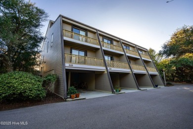 Oceanview condo with peaks of the ocean surrounded by the on The Country Club of the Crystal Coast in North Carolina - for sale on GolfHomes.com, golf home, golf lot