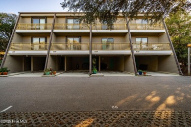 Oceanview condo with peaks of the ocean surrounded by the on The Country Club of the Crystal Coast in North Carolina - for sale on GolfHomes.com, golf home, golf lot